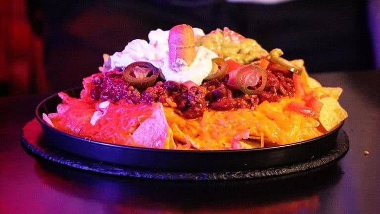 Valencian paella of Flor de Valencia dish of nachos from Brutal58 restaurant